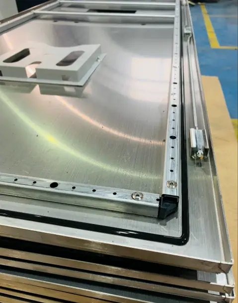 Formed cabinet door perimeter and gasket channel detail