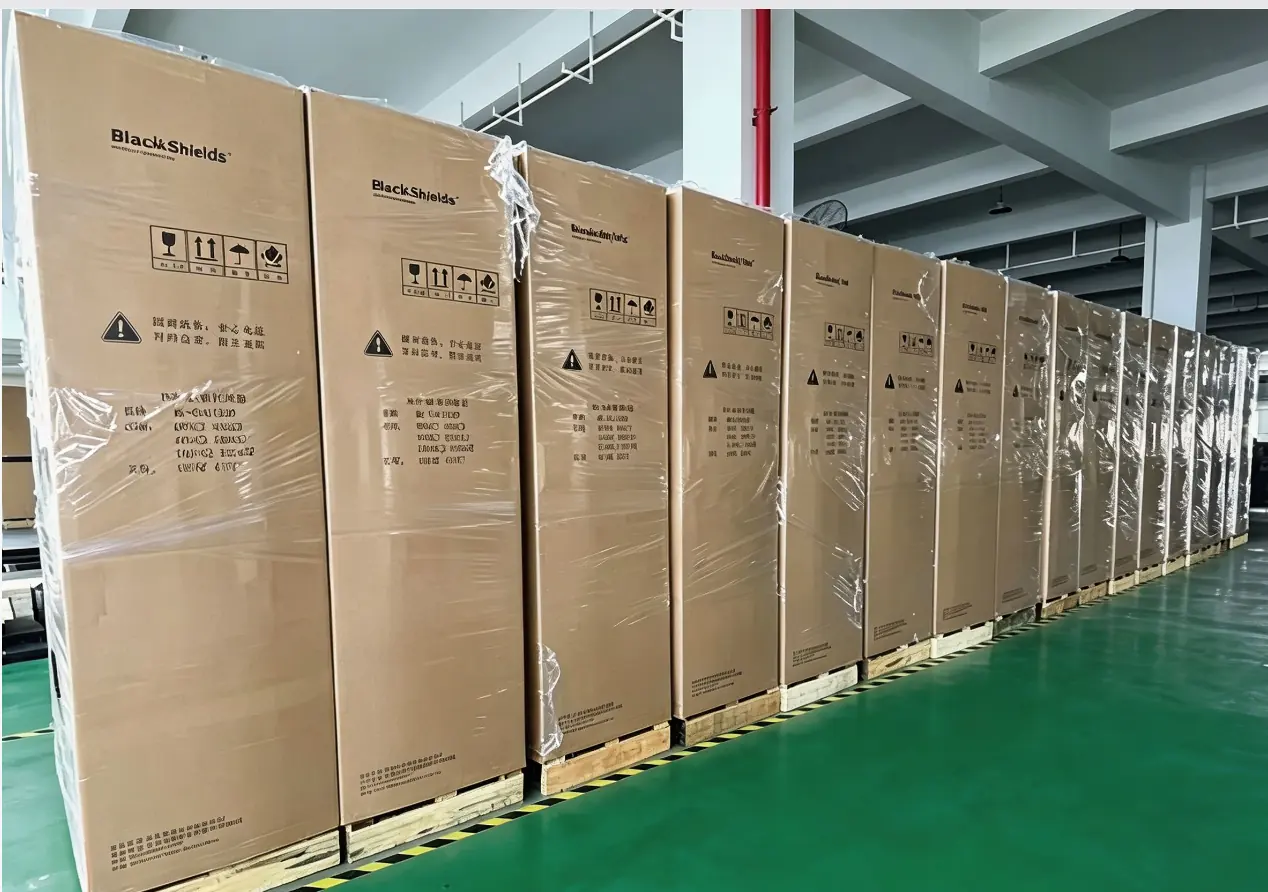 Export cartons for network cabinets lined up on pallets before shipment