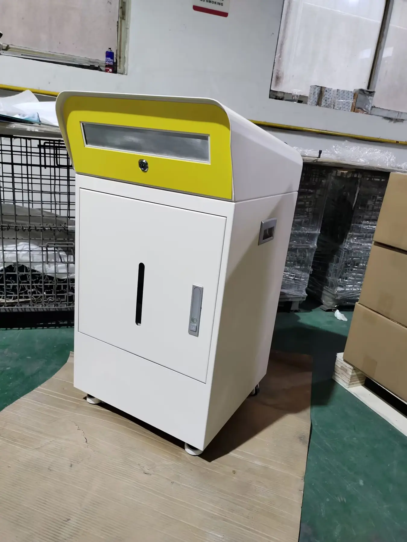 Completed powder-coated sheet metal cabinet showing the finished surface and assembled panels