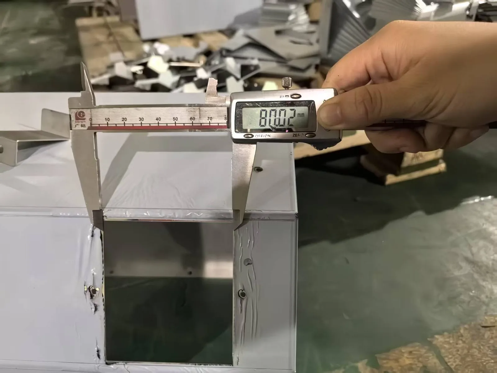 Dimensional check recorded against the enclosure drawing