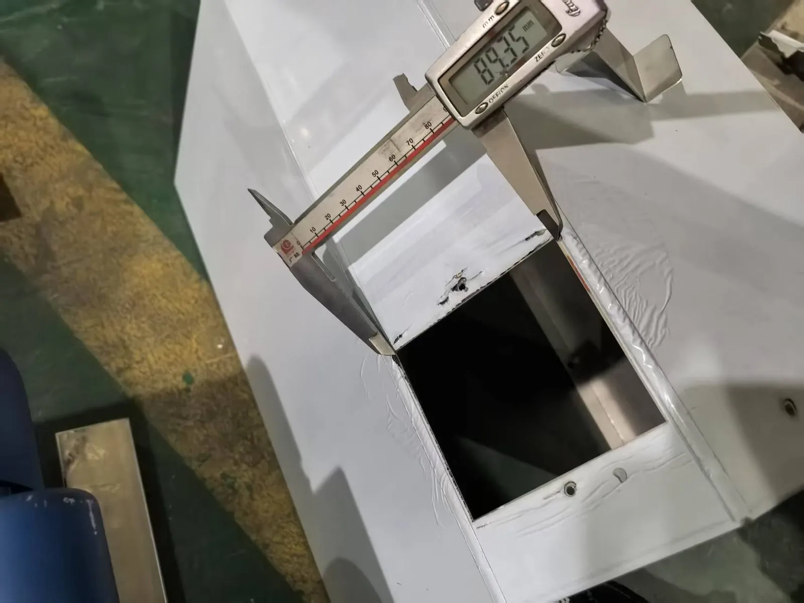 Measuring the critical dimensions of a sheet metal enclosure