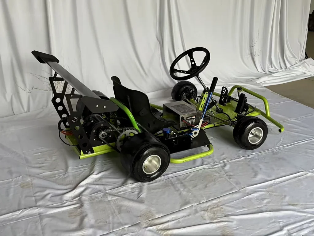 Welded tubular steel go-kart frame chassis with green powder-coated frame and engine mount, fabricated at Fulei Metal
