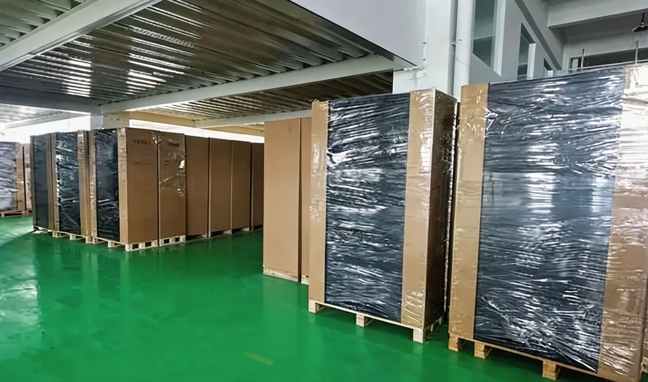 Black network cabinet enclosures packed on pallets for export shipment