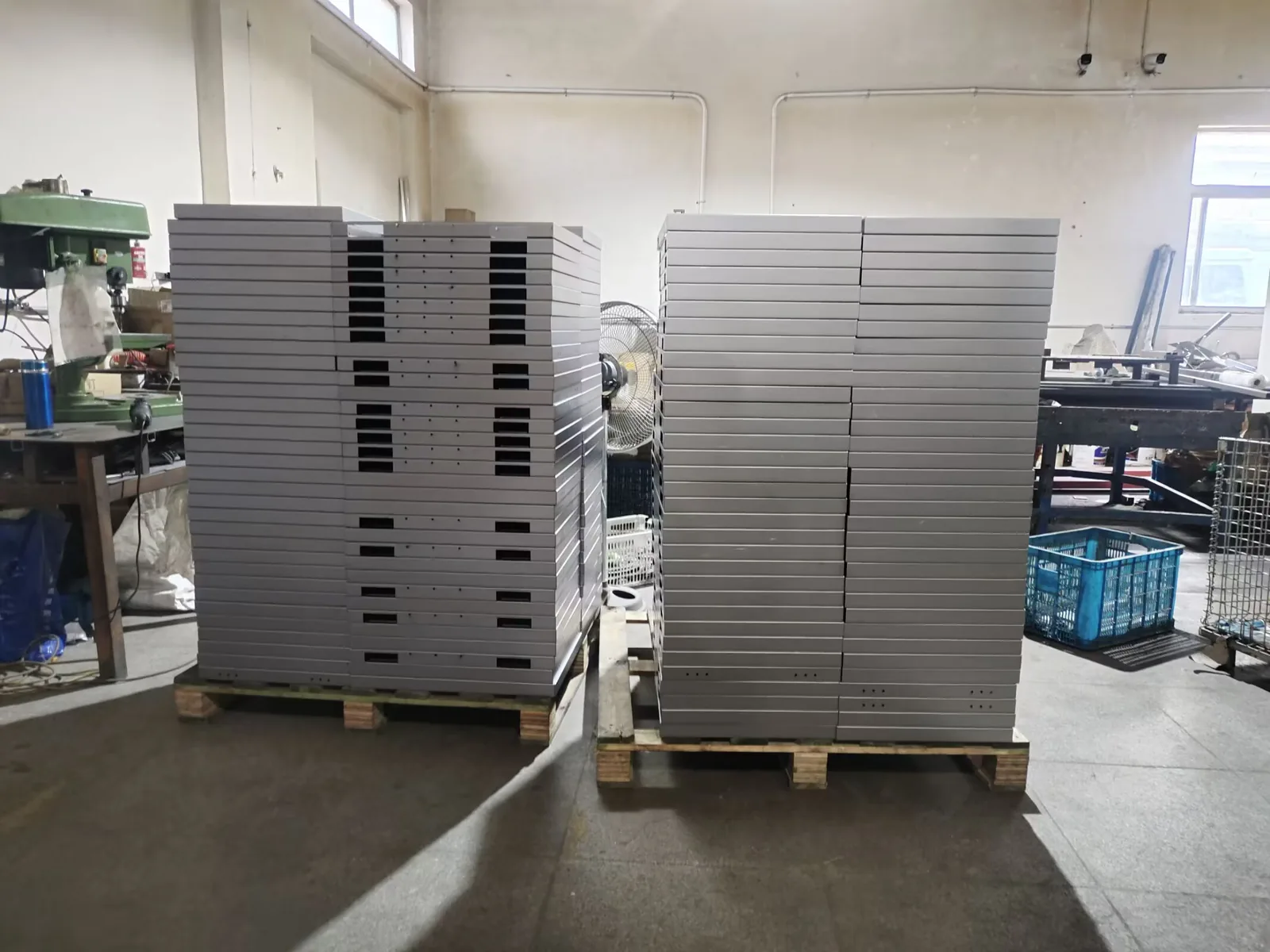 Bent stainless steel enclosure parts staged after press brake forming at Fulei Metal
